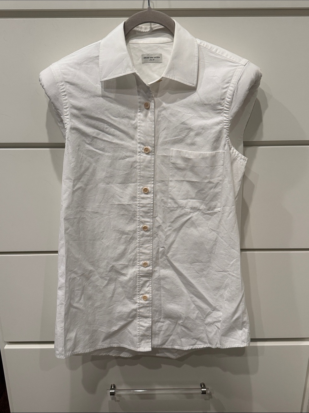 Dries Van Noten Sleeveless Button-Down Shirt in White with shoulder pads
